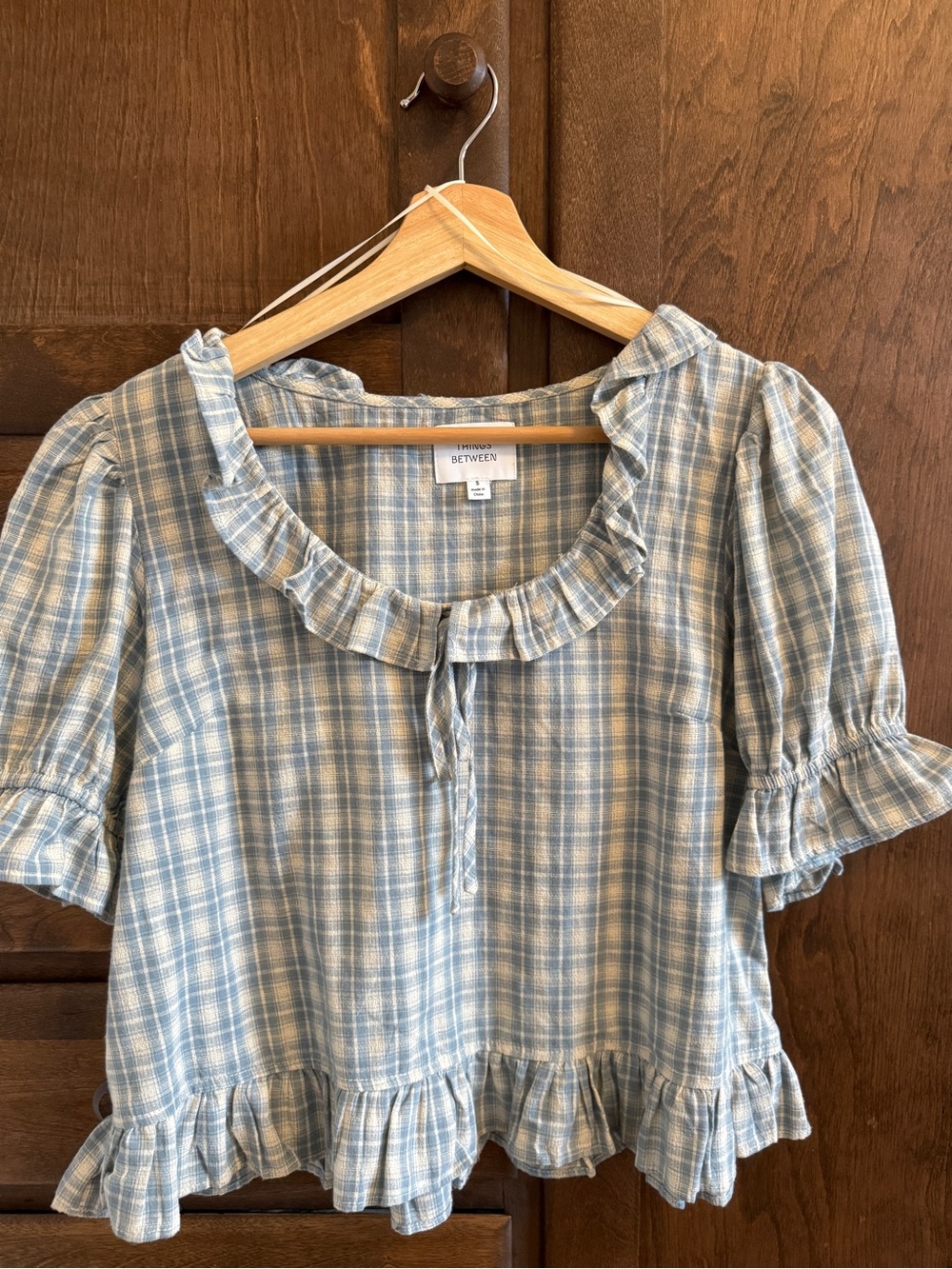 Carly Jean LA things between Blue Plaid Ruffle Sleeve Women’s Top